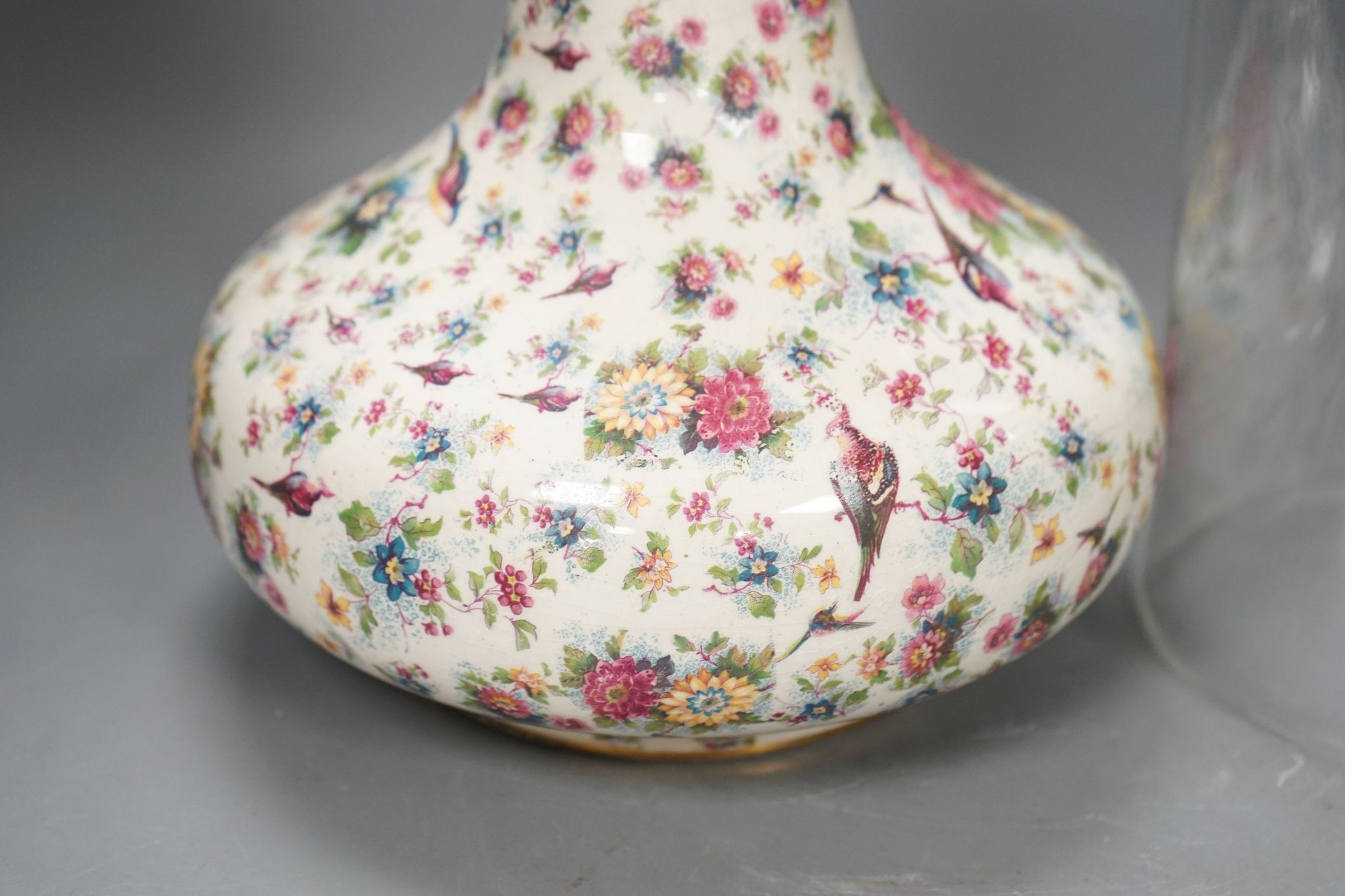 A mid 20th century Chintz vase and a glass dome, vase 27cm